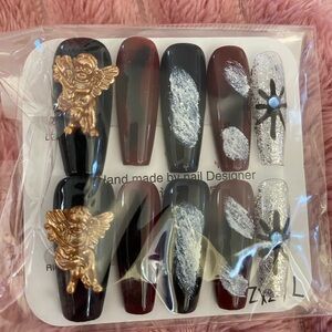 Black and Red Nail Set with Gold Angel Accents